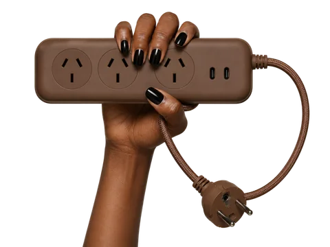 Chocolate Brown Roamboard held in one hand with a matching brown cable