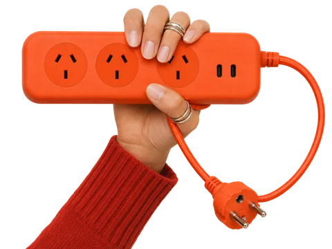 Cosmic Orange Roamboard held in one hand with a matching orange cable