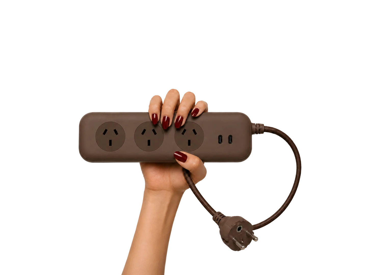 Chocolate brown Roamboard held in one hand with its braided European plug cable